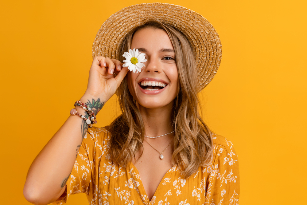 Woman with bright smile after cosmetic dental treatment in Spring TX